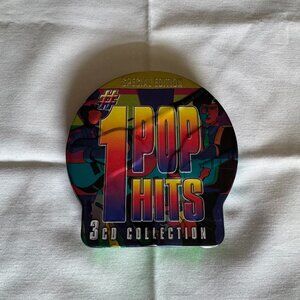 United Audio Entertainment Embossed Tin - 3 CD Set - #1 Pop Hits - 48 Tracks